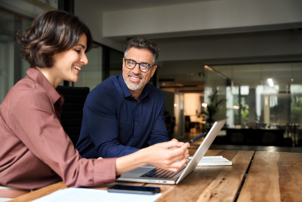 Business colleagues discussing together