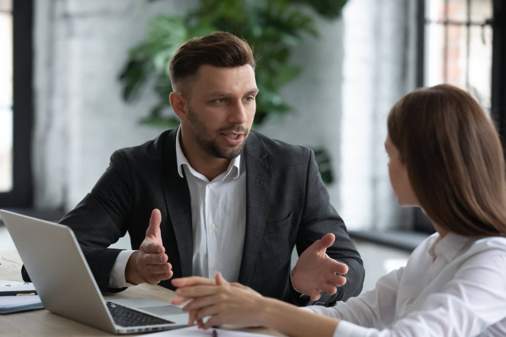 Business discussion in office setting